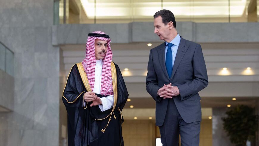 Saudi Foreign Minister Prince Faisal bin Farhan meets Syrian President Bashar Al Assad in Damascus on April 18, 2023. - Saudi Press Agency